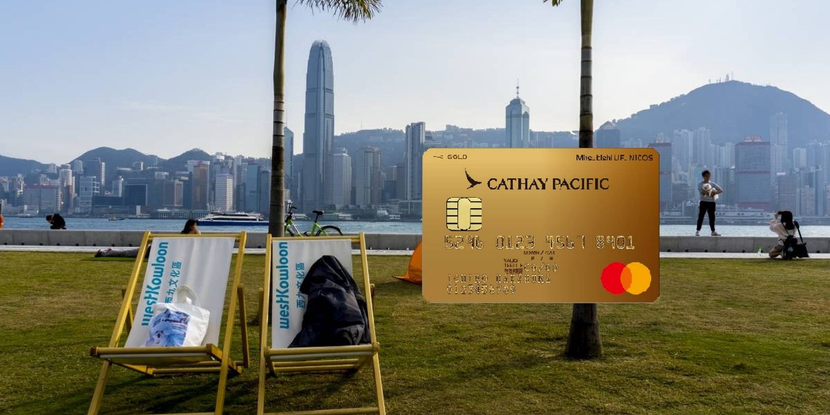 Female holding credit card